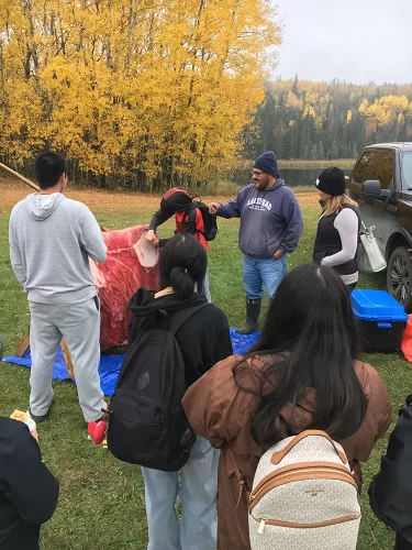 Demonstration of a hide being cleaned at Fall Harvest.