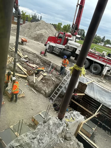 Entryway construction crew working.