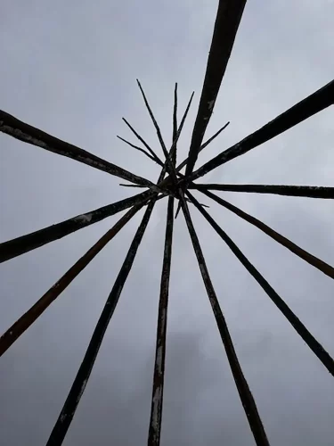 Teepee frame as seen from the bottom looking up at the middle.